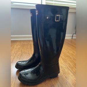 Glossy black hunter boots